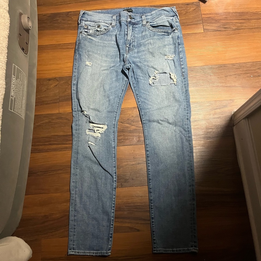 True Religion Light Blue Distressed Slim Jeans by Rocco